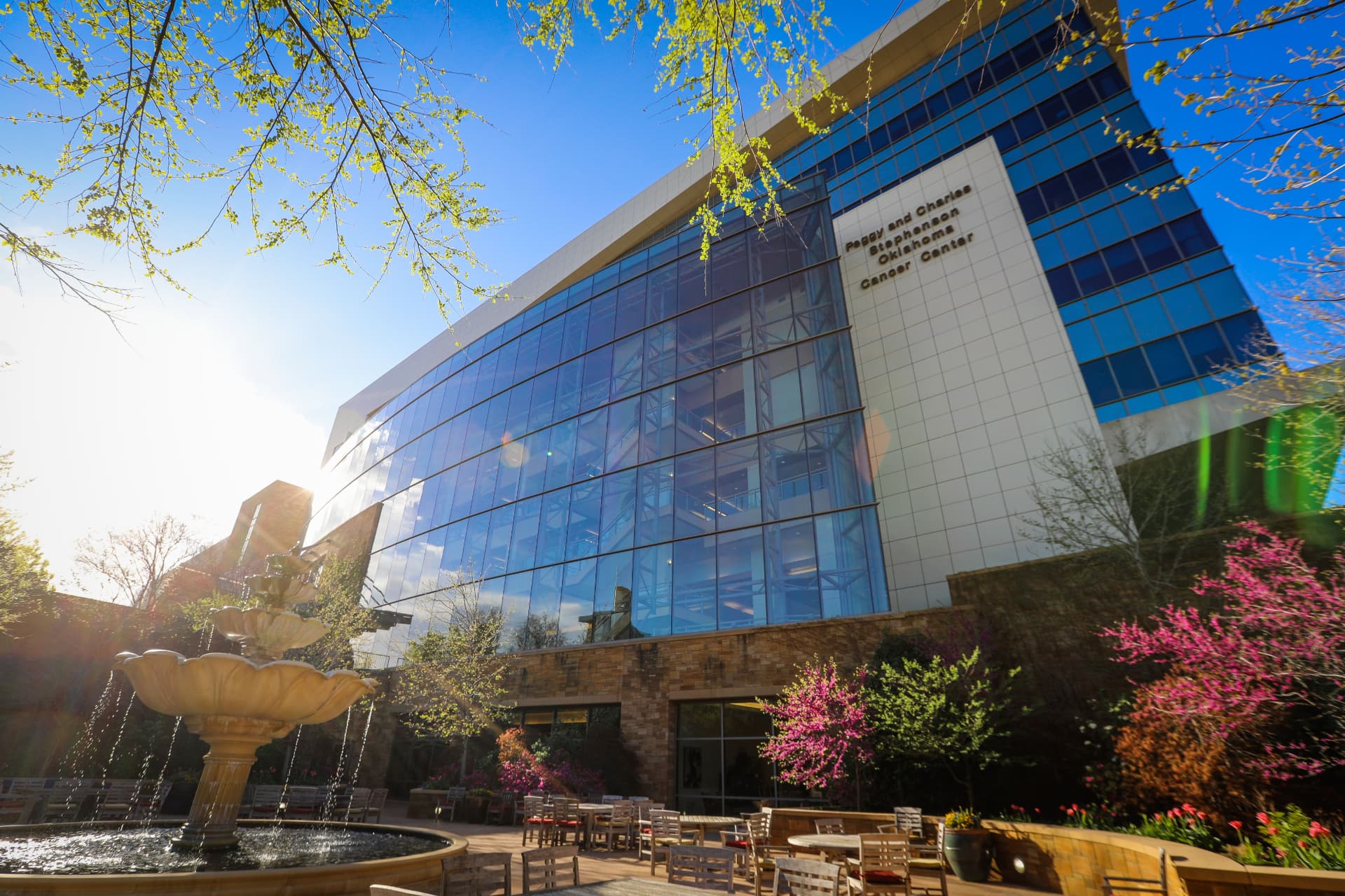 The Peggy and Charles Stephenson Oklahoma Cancer Center exterior with its courtyard fountain